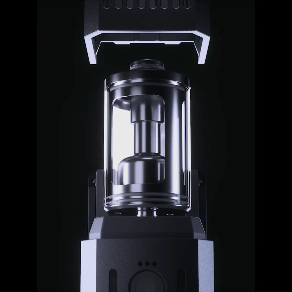A close-up of the PMI SmokeNINJA/GENIE Rep Shockproof Chamber—a stainless steel, cylindrical component in a transparent casing—set against a dark background, designed for use with industrial fog output equipment.