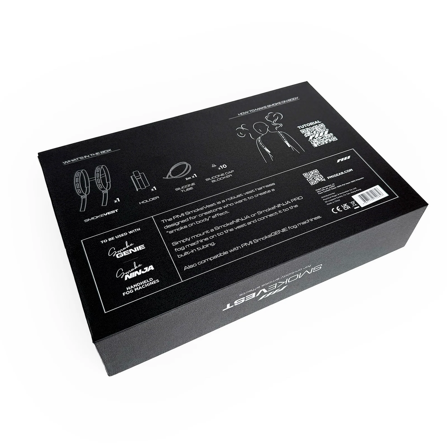 A black rectangular box with white text and illustrations shows details, usage instructions, and compatibility for the PMI SmokeNINJA PRO/NINJA/GENIE PMI Smoke Vest (PMI_AC_SVEST) by PMI. Logos, signatures, and a barcode are also on the packaging.