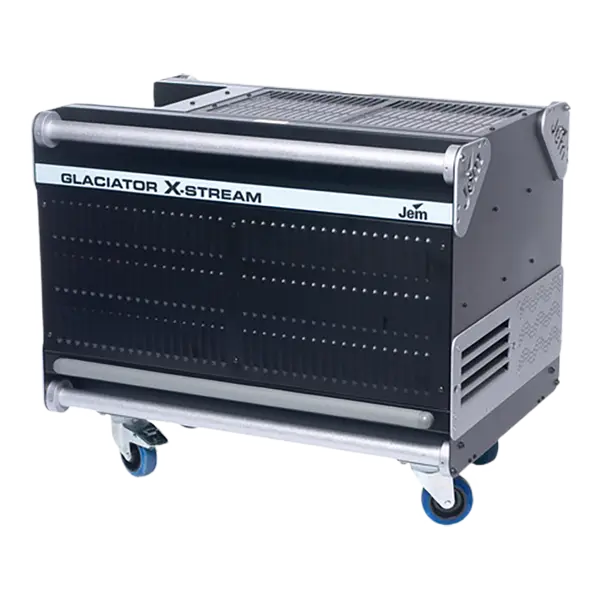 The JEM Professional Glaciator X-Stream is a large black and silver machine mounted on blue caster wheels, designed to produce striking ground-hugging fog effects; the JEM Professional brand name appears on the front panel.