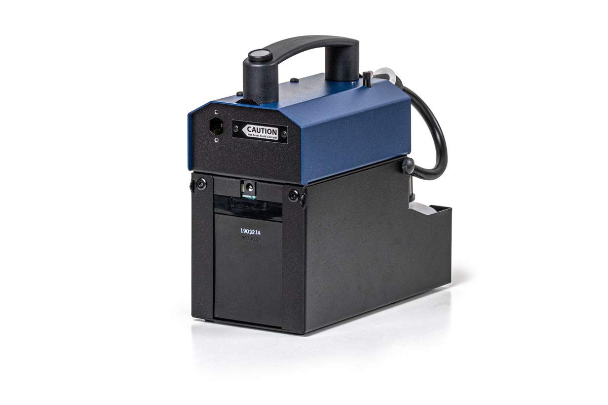 The Look Solutions POWER-TINY Hand Held Small Fog Generator (LOO300) is a compact, portable fog machine featuring a black base, blue top, handle, caution label, and rear power cord; designed for powerful off-mains fog output.