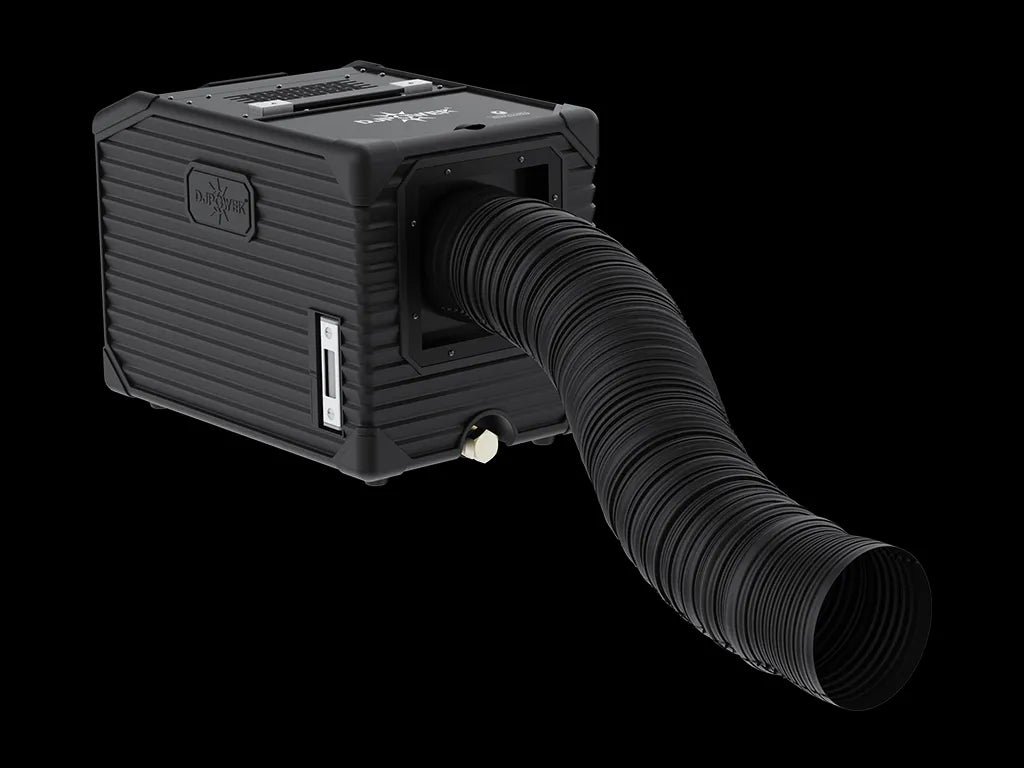 A DJ Power MINI AQUA LOW FOG MACHINE by DJ Power, in black and box-shaped design, is shown with a flexible ribbed hose attached at the front against a black background. The device features a side control panel and a knob.