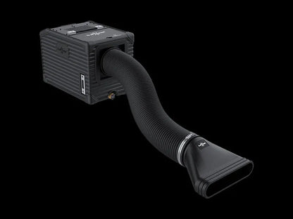 The DJ Power MINI AQUA LOW FOG MACHINE, a compact black box-shaped device from DJ Power, features a ribbed flexible hose ending in a wide, flat nozzle. Displayed on a black background, this fog machine uses ultrasonic technology to create dense, low-lying fog effects.