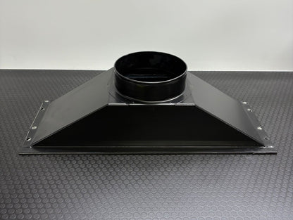 Black Glaciator Dynamic emitting a large amount of white smoke or vapor on a concrete floor from the Single Output ducting adaptor.