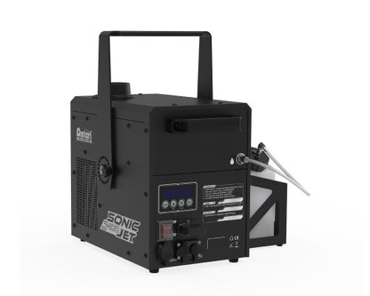 A black Antari J-100 Jet Fog Machine by Antari, featuring a control panel, switches, a top handle, and a visible fluid container on the side, designed for producing artificial snow effects similar to those of a stage fog machine.