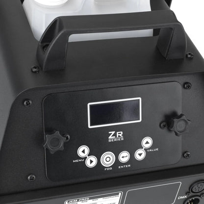 Close-up of a JEM ZR25 230V/50-60Hz fog machine by JEM, showing its handle, digital screen, control knobs, Menu/Fog/Enter/Value buttons labeled "ZR Series," with a plastic bottle behind the handle.
