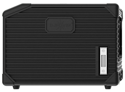 A black, rectangular DJ Power MINI AQUA LOW FOG MACHINE with a ribbed texture, featuring the DJ Power logo on one side and a small clear window with a white button near the bottom right corner—designed with the sleek aesthetics of a portable fog machine.