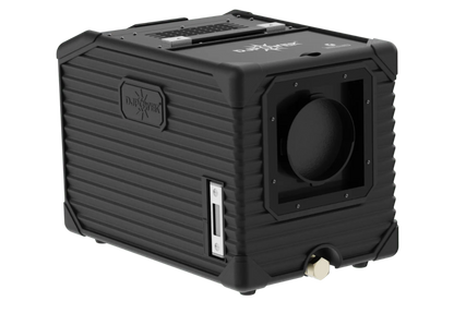 A black, rugged, cube-shaped electronic device with ribbed sides, a circular opening on one face, and labeled DJ Power. Designed as the DJ Power MINI AQUA LOW FOG MACHINE, it features various ports, buttons, and a handle on top for portability.