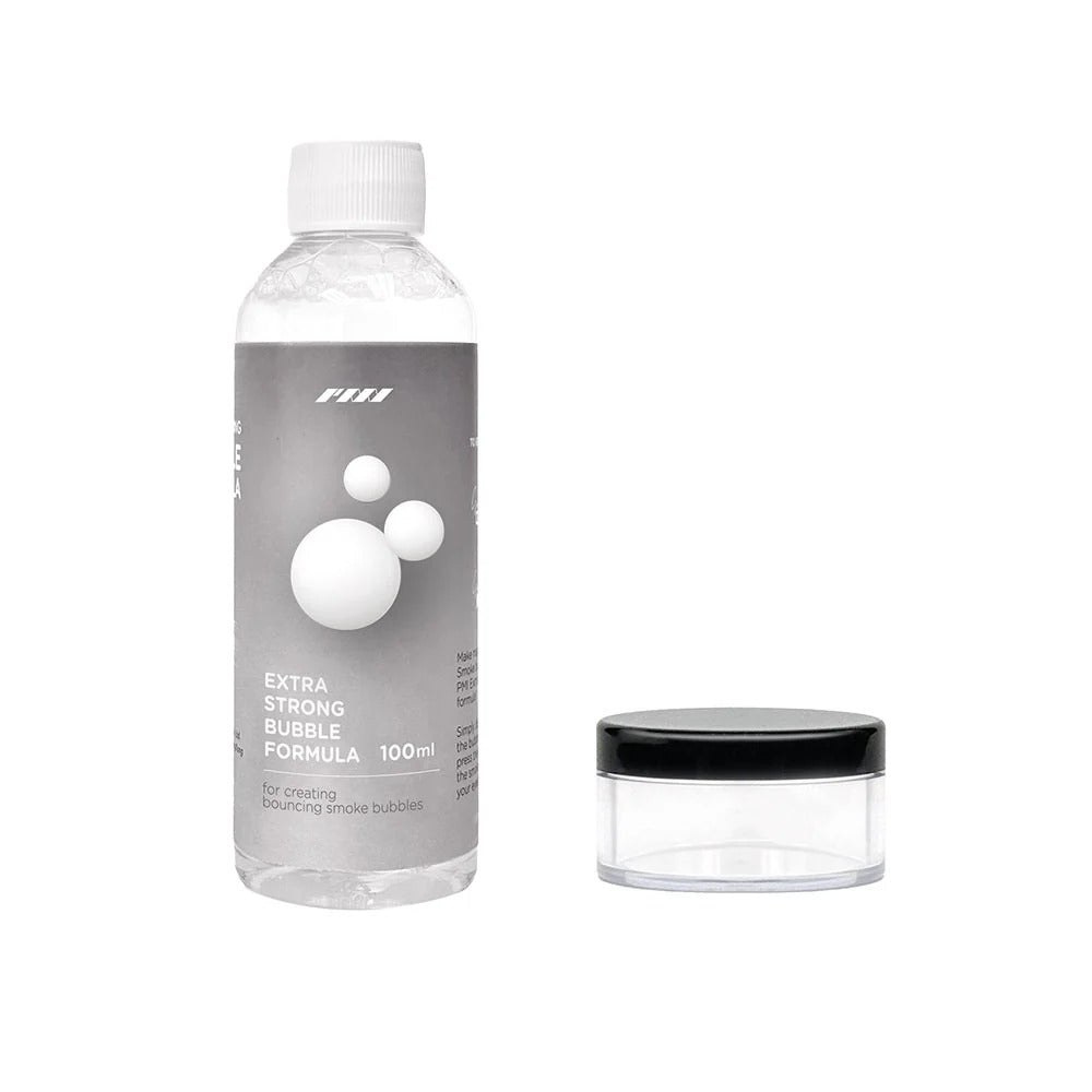 A clear bottle labeled SmokeNINJA Bubble Solution 100ml by PMI stands beside a small round black-lidded container—ideal for bubble fans seeking vivid effects or smoke-filled bubbles on a white background.