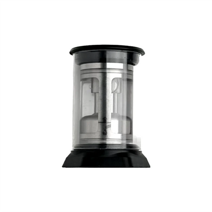 The PMI SmokeNINJA/GENIE Rep Shockproof Chamber is a transparent cylinder with a black base and lid, featuring a visible stainless steel mechanism—ideal for displaying your SmokeGENIE's fog output.