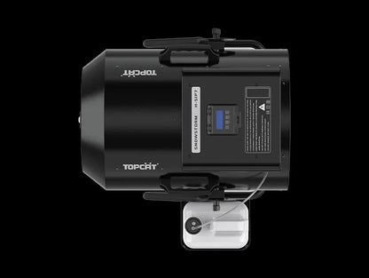 Top-down view of a black, rainproof DJ Power DJ Power H-SIP7 SNOWSTORM industrial snow machine with a rear-mounted control panel, an attached fluid tank, and carrying handles.