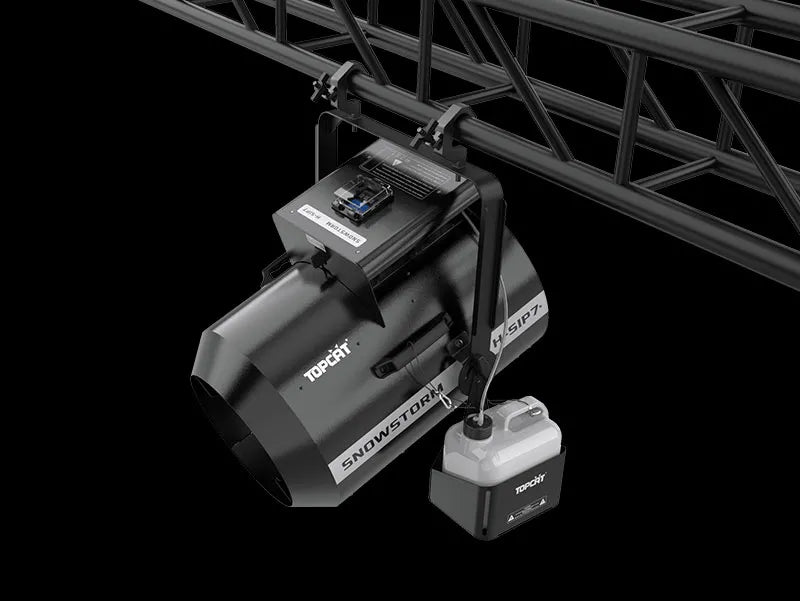 A professional rainproof DJ Power H-SIP7 SNOWSTORM snow machine mounted on a black metal truss, featuring a side-mounted fluid container and labels reading TOPCAT and SNOWSTORM.