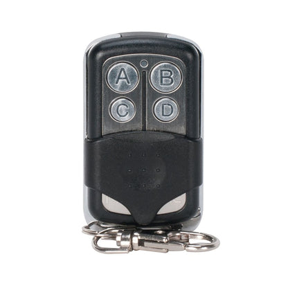 The Elation Magmatic Mag-T Remote (ELA-1412000012) is a black wireless remote control with four round buttons (A, B, C, D), a metal keyring, designed for use with Magmatic Atmospheric products.