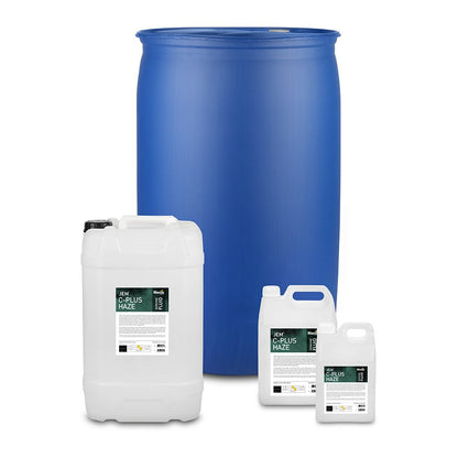 Four containers are shown: a large blue industrial barrel and three white jugs with handles and labels, each containing JEM C+ Fluid, a water-based haze fluid for Martin/JEM Compact Hazer/Hazer Pro. Brand: JEM.