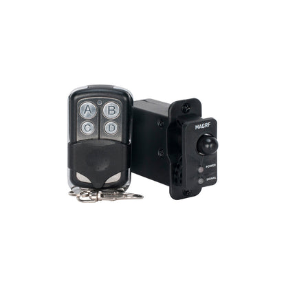 A black remote with four labeled buttons (A, B, C, D) and a keychain sits beside an Elation Magmatic MagRF wireless module (ELA-1412000013), featuring power and signal indicators, on a white background.